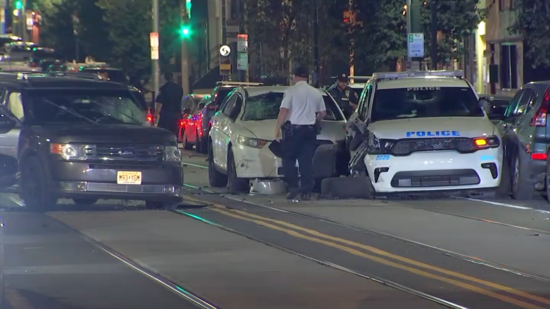 4 people injured after van strikes police cruiser, other vehicles on Girard Ave.