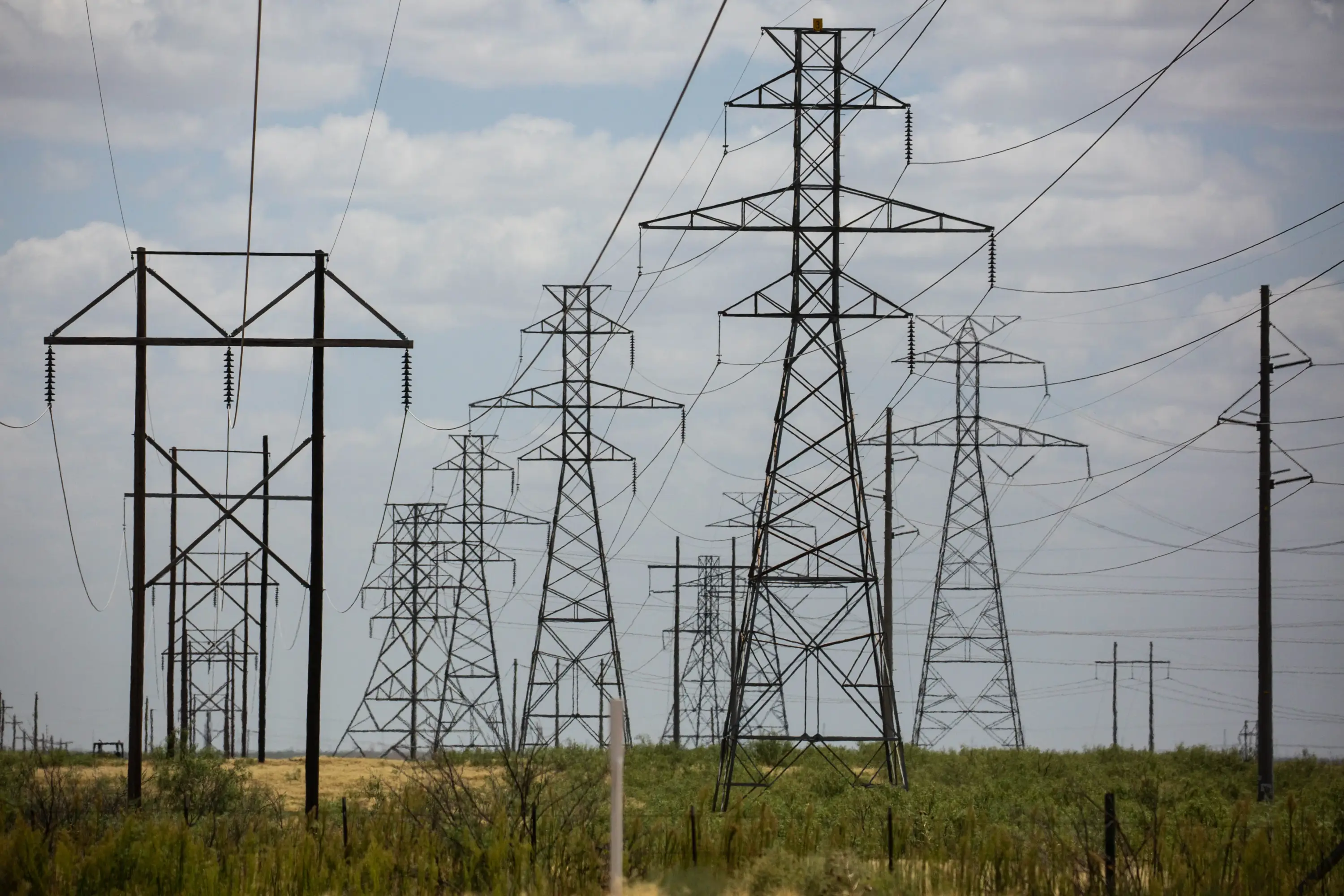 Despite protest, regulators clear path for bigger transmission lines across Texas