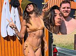 Strictly's Karen Hauer, 44, flashes her abs in a skimpy bikini as she shares rare snaps with boyfriend Simon Davidson after being axed from show