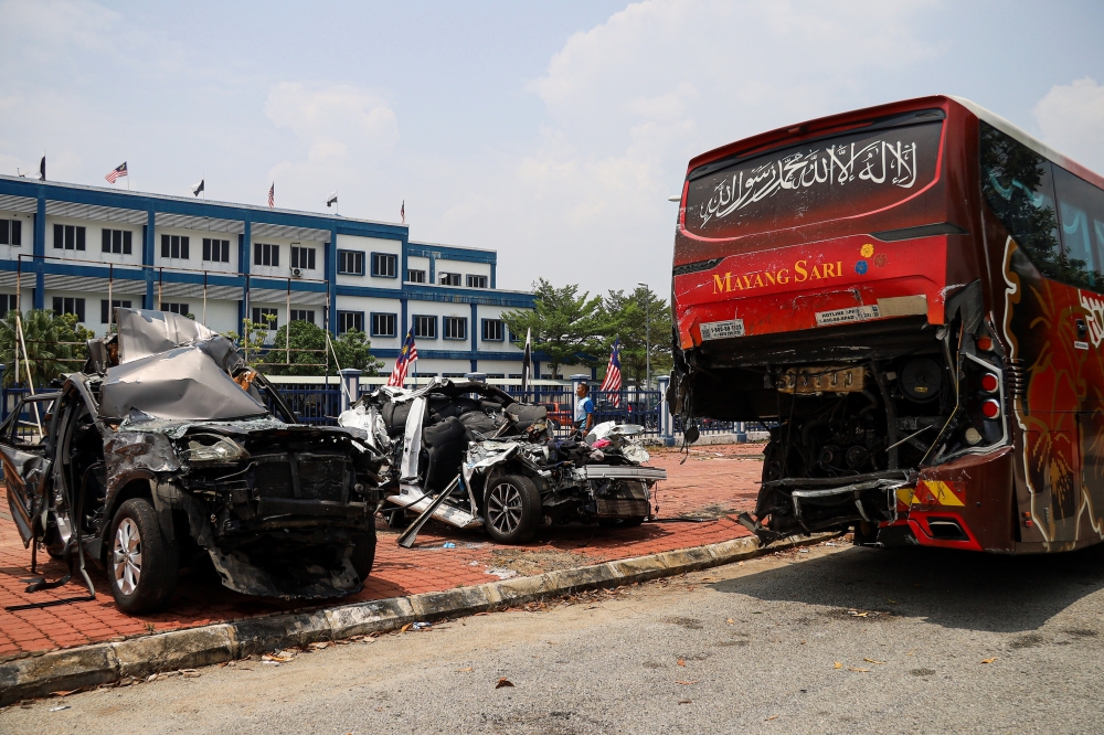 Anwar calls for answers in 11-vehicle crash on LPT1 that killed four including family on way home from N-Day parade