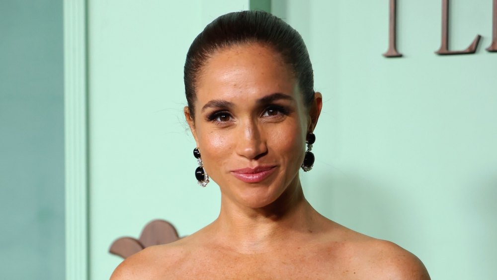 Meghan Markle Stuns in Sundress During ‘Last Days of Summer’ Before U.K. Move