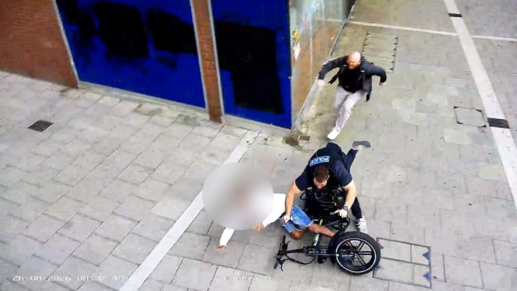 Police officer's flying leap to tackle e-bike rider