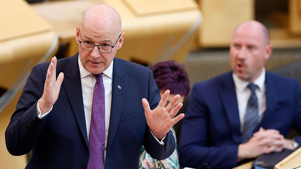 How will Swinney 'rewire' local government and public services?