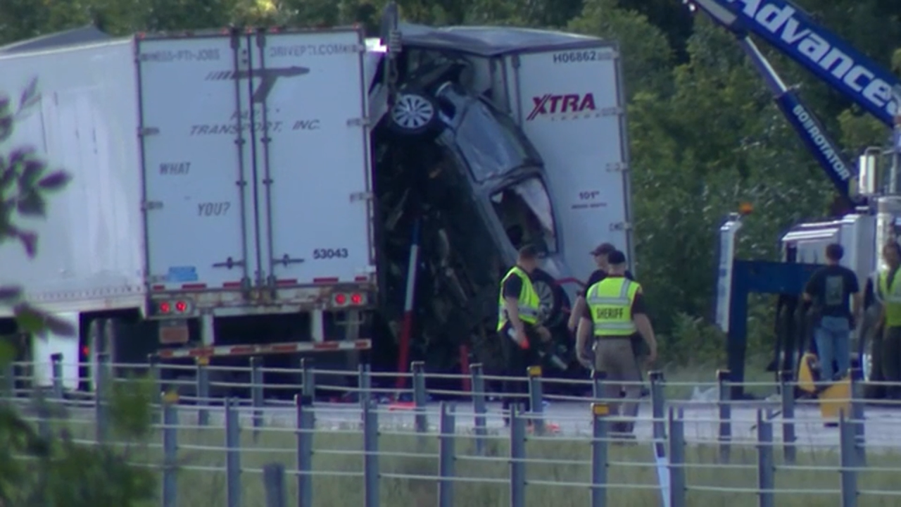 ‘It was a miracle’: Family survives 6-vehicle pileup, trapped inside car stuck between semis