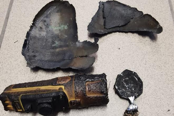 Firefighter’s helmet was destroyed by flames. The fire service did not have it examined