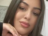 Mother who 'murdered her newborn daughter with her boyfriend's family' weeps in court as trial over death of baby who was 'stabbed 15 times' at Sheffield home set for next year