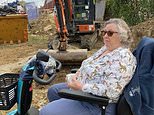 Pensioner, 76, blocks diggers with her mobility scooter saying she 'doesn't mind being arrested' in row over building work