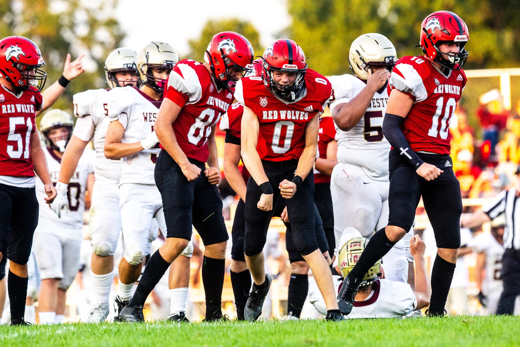 See photos as Paw Paw football puts on clinic in home-opener, defeats Parma Western