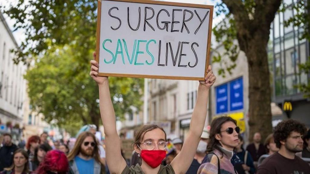 Answers needed on transgender surgery pause, says health minister
