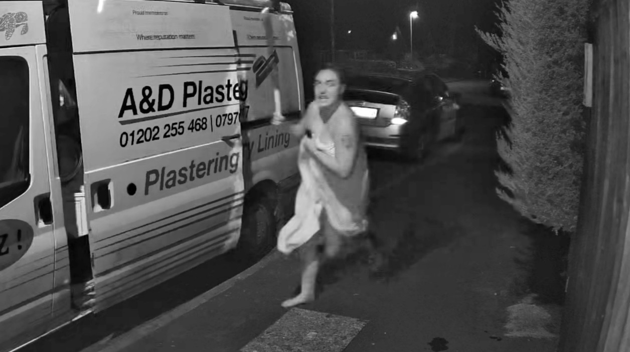 Moment woman, 21, chases car thief wearing nothing but bath towel & armed with baseball bat after security camera alert