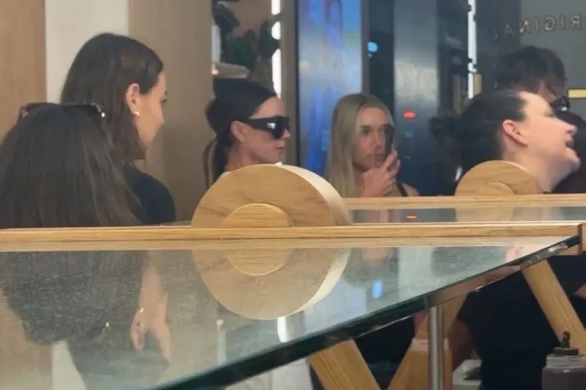 Victoria Beckham and daughter Harper spotted cooling off in frozen yogurt shop in London – would you have noticed?