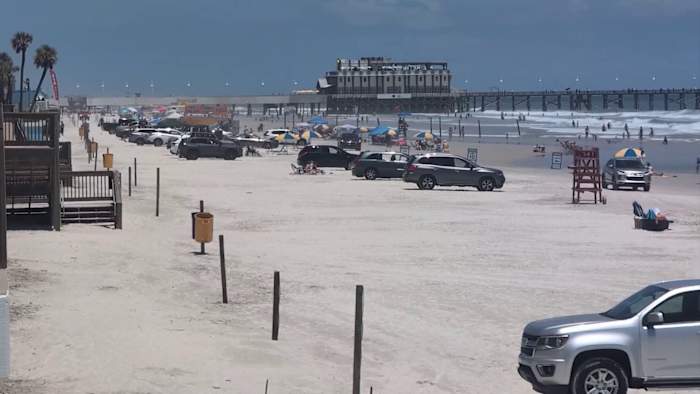Beach safety sergeant saves choking infant using Live 911 technology