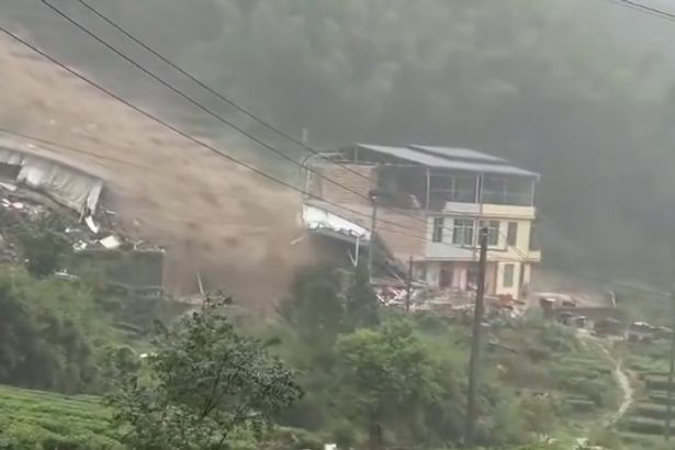Multiple people buried alive by landslide in China as rescue teams race to scene