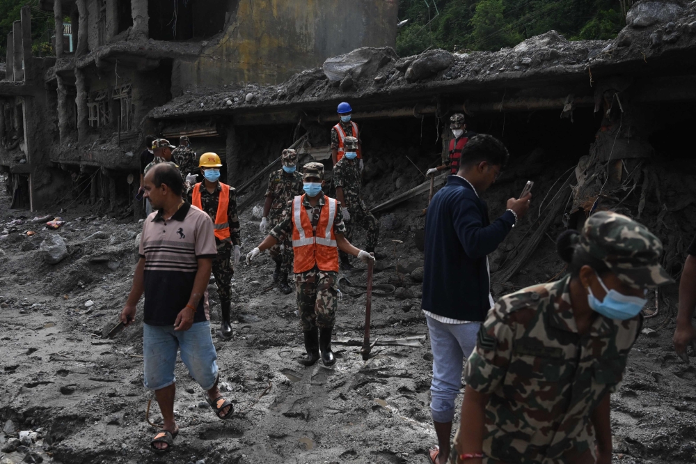 In Nepal for eight days, Malaysian wife presses on with search for missing special‑operations firefighter