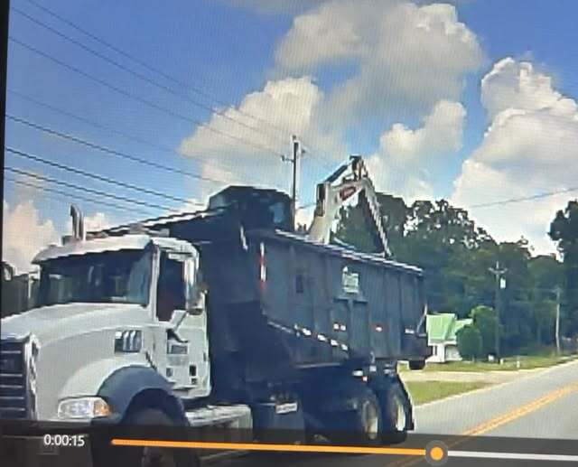 Man arrested after truck downs power line in Social Circle, police say