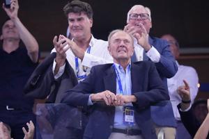 Dick Gould, who won 17 NCAA championships at Stanford, celebrated at the US Open