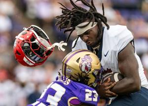 JMU football holds on to claim first win under Billy Napier
