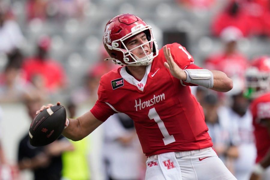 Weigman throws for 305 yards and leads No. 23 Houston to a 33-20 win over Oregon State