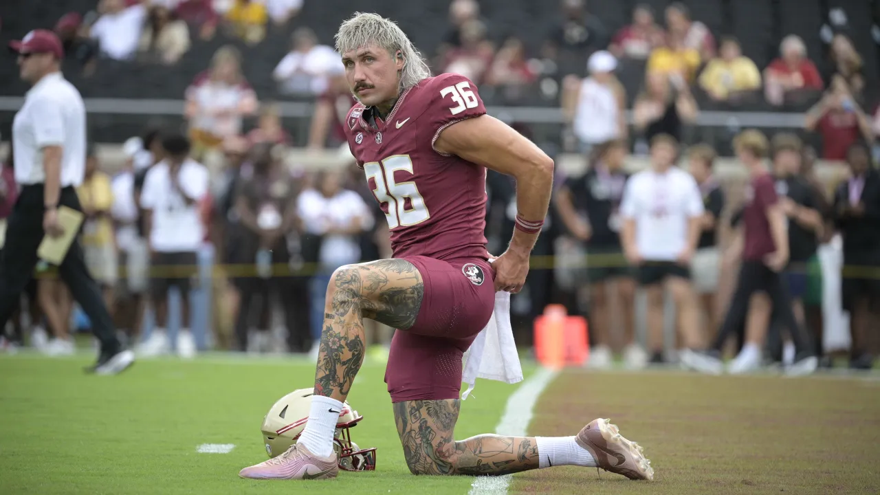 Meet FSU's 28-year-old Australian punter rocking bleached mullet, head-to-toe tattoos