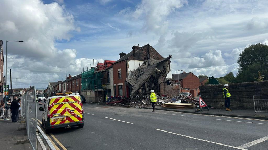 Building collapses after van smashes into it