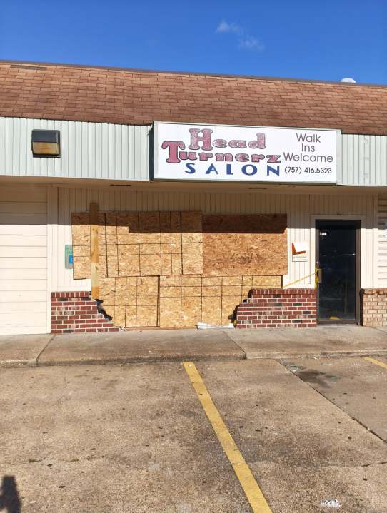 SUV accidentally crashes into business on Azalea Garden Road