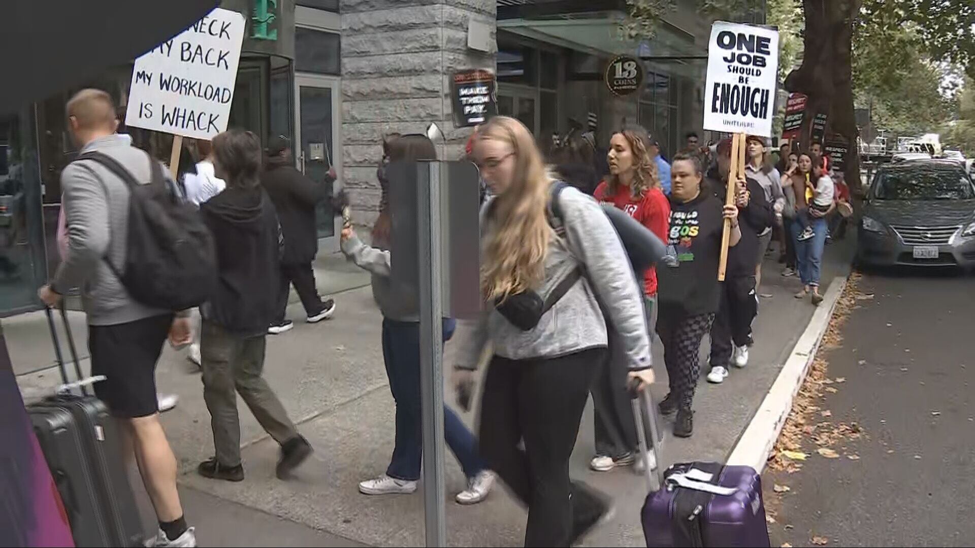 Seattle mayor, King County executive join striking workers at Embassy Suites