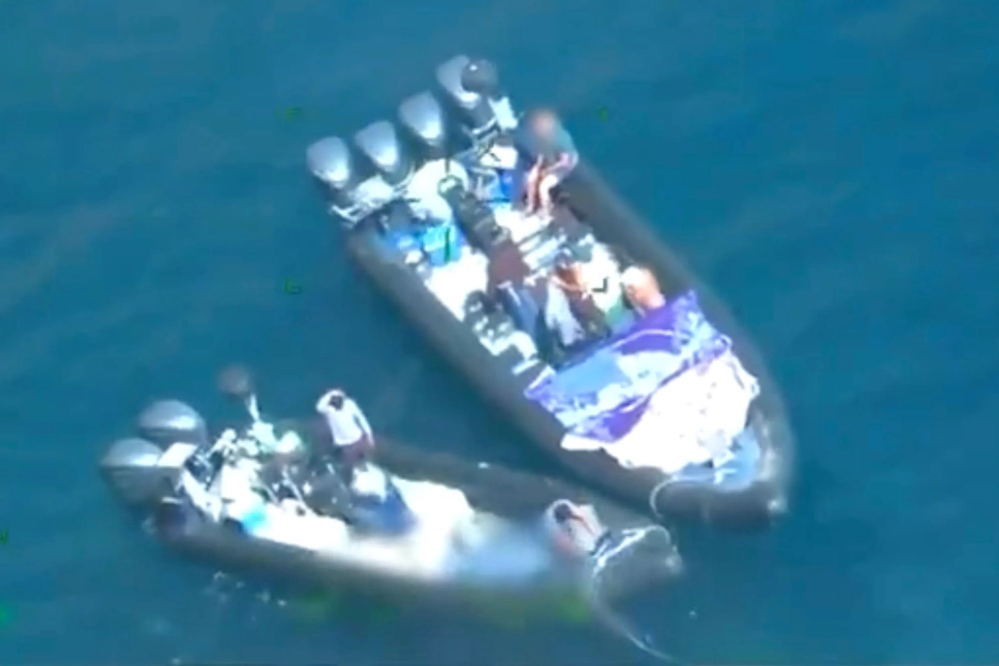 People smugglers on speedboat ‘taxis’ dumping migrants overboard by ‘threatening them with machetes’ in tourist hotspot