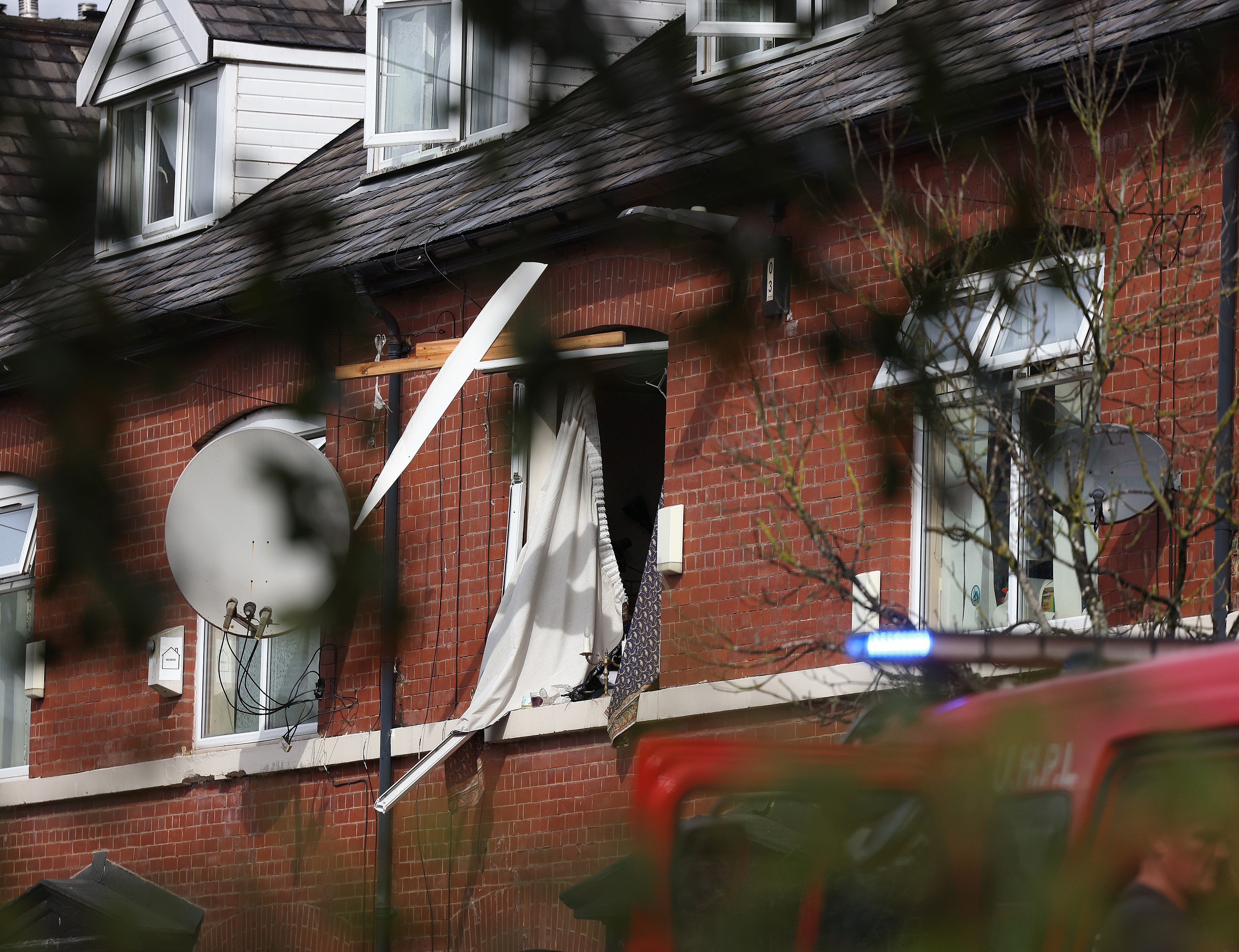 Man fighting for life and woman injured after house explosion blew out windows and neighbours evacuated