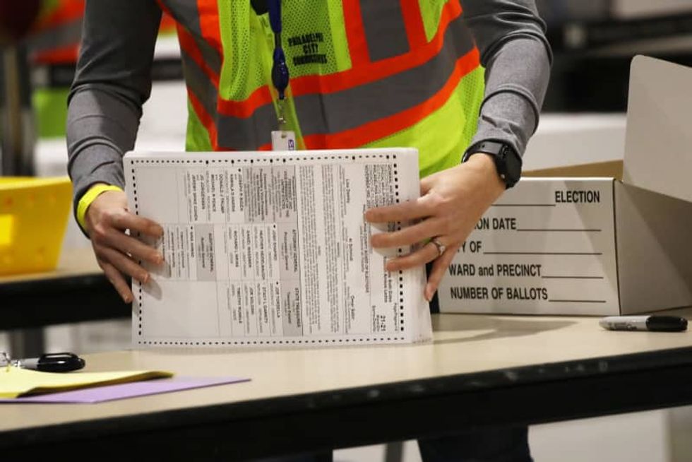 Judge guts Republican crusade against mail-in voting with a single word