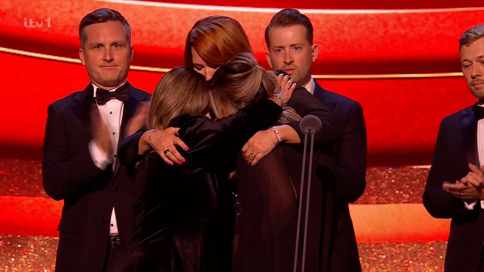 Emotional moment families of Southport victims hug on stage after BBC documentary wins NTA