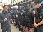 Balaclava-clad anti-migrant activists led by convicted criminal 'Danny Tommo' stage latest protest outside Daily Mail office