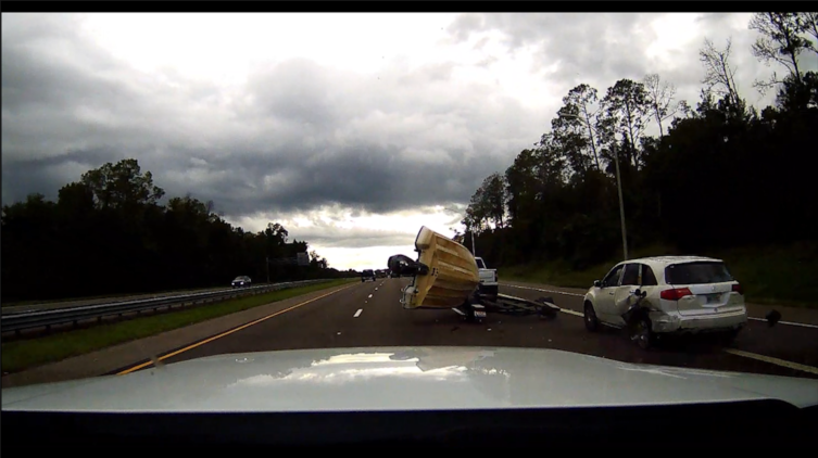 Video: Boat sent flying from trailer after crash on Florida highway