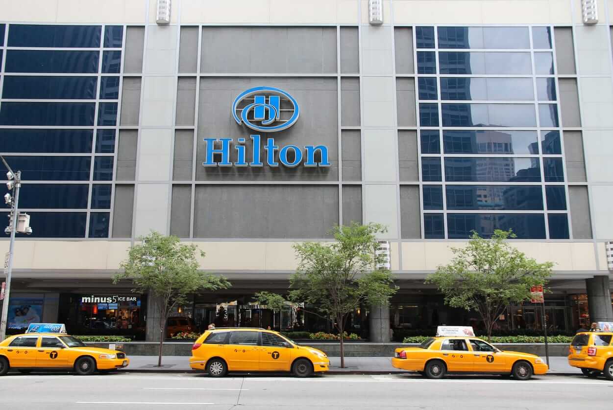 How Is Hilton Worldwide's Stock Performance Compared to Other Leisure and Entertainment Stocks?