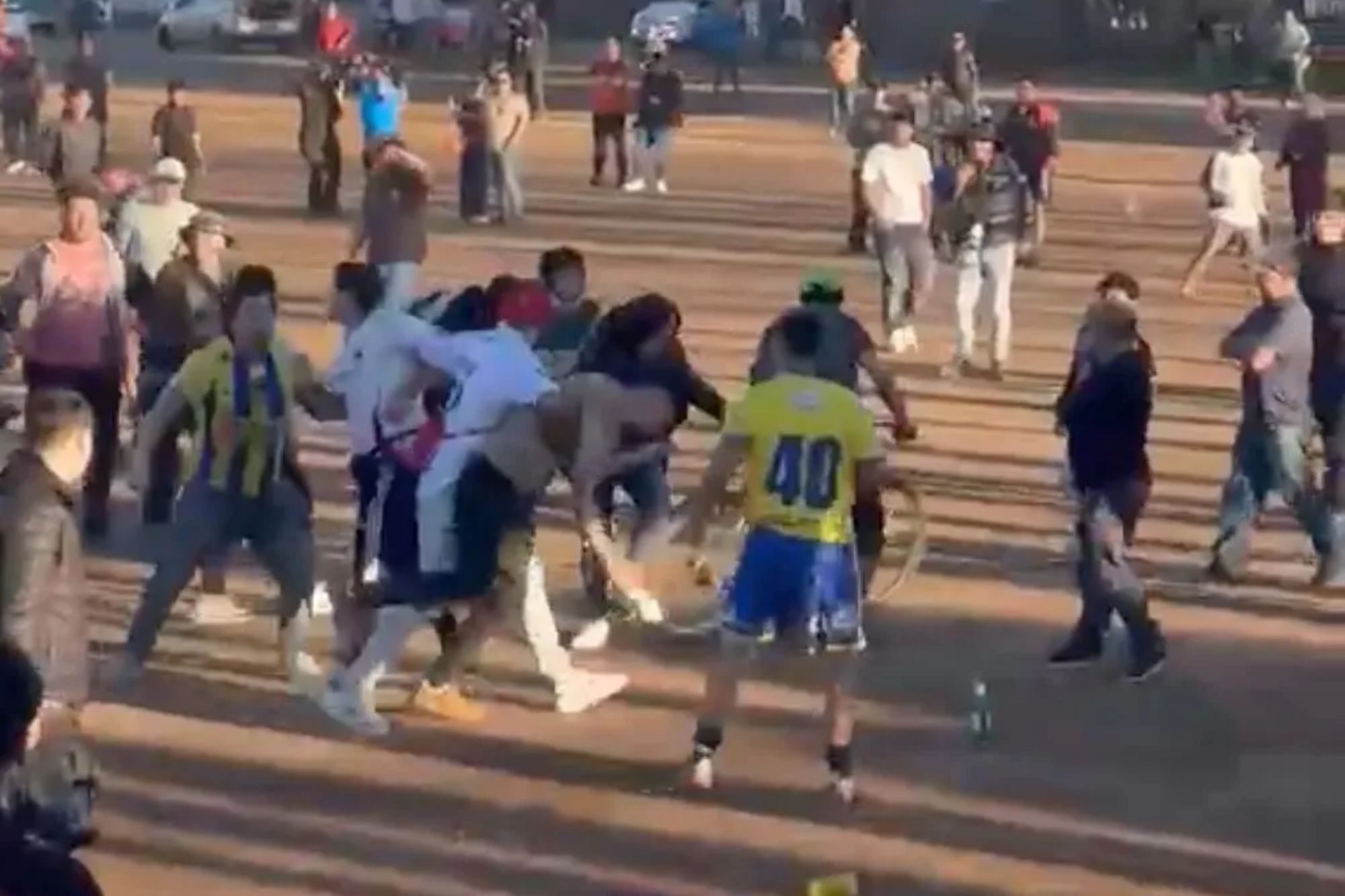 Moment mass brawl erupts at Sunday League football match with players throwing punches as game descends into violence
