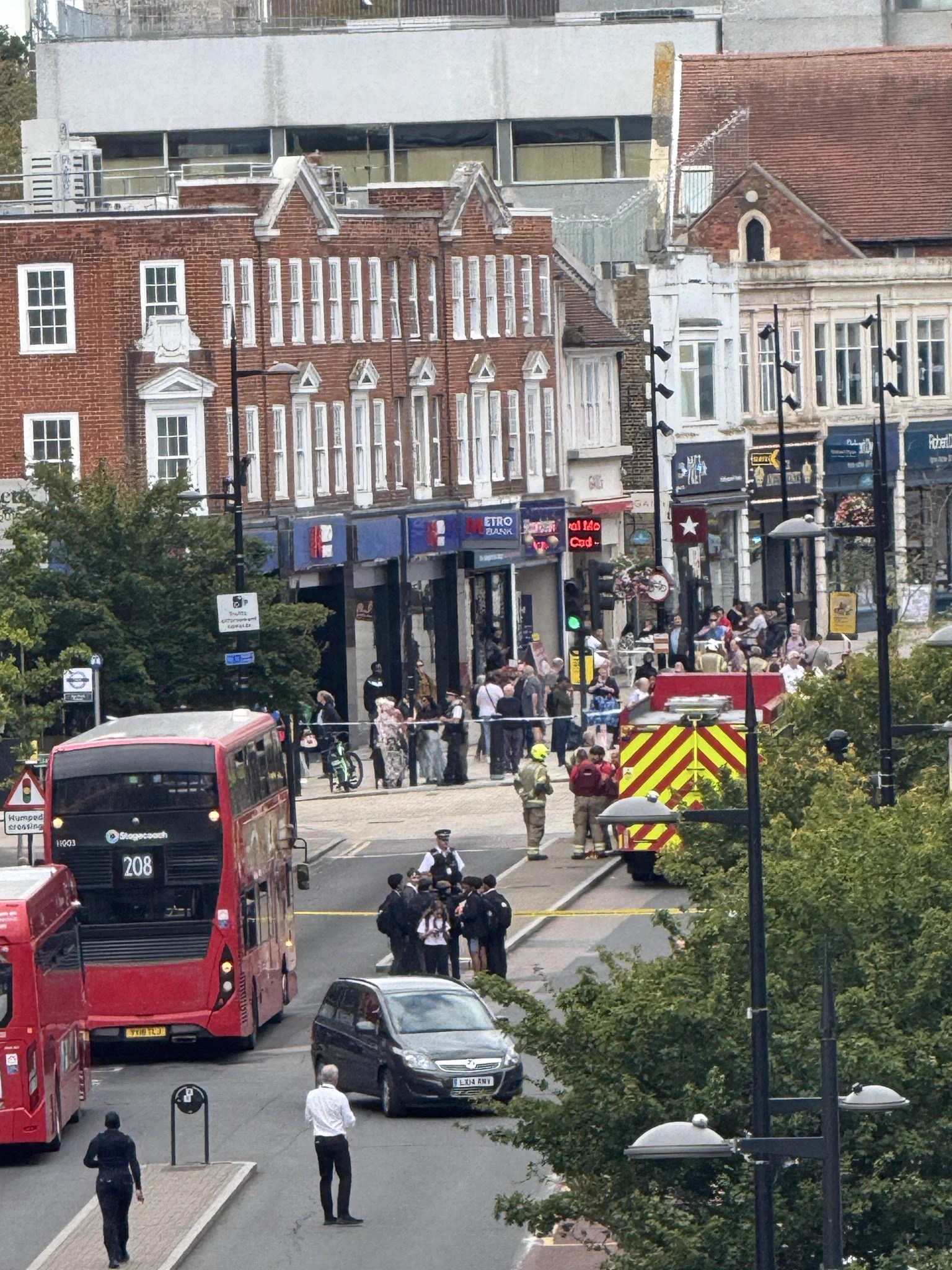Four injured after broad daylight ‘knife attack’ in busy high street as town centre cordoned off
