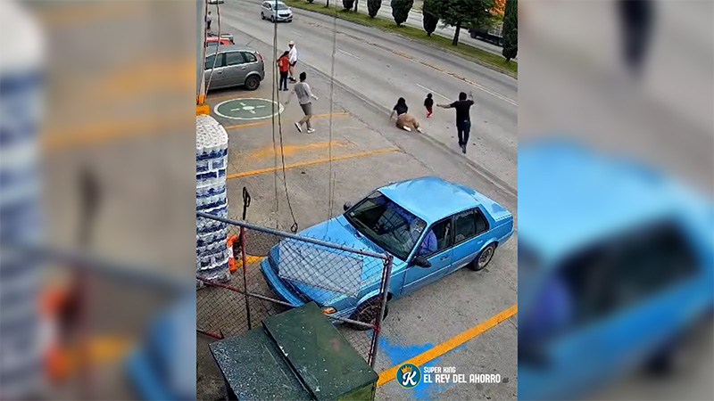 WATCH: Supermarket manager rushes to save young girl from running into oncoming traffic