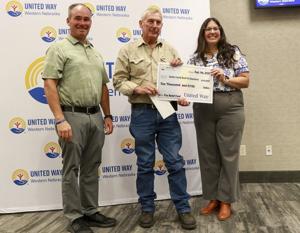 United Way awards $100,000 to local fire departments after spring wildfires