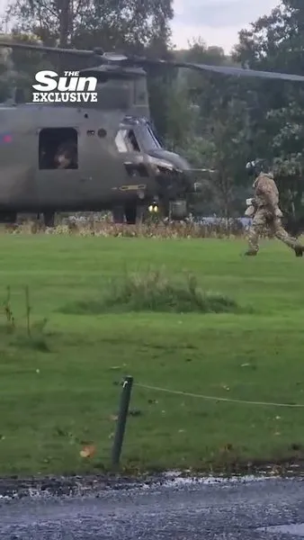Moment RAF chopper stuns guests at £2k a night hotel by landing on lawn before crew nip in to collect CAKE