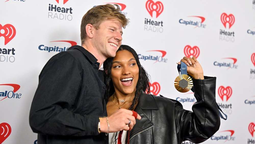 Olympian Tara Davis-Woodhall Jokes About Paralympian Husband: 'I Hate Feet'