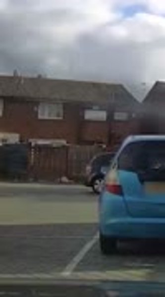 Moment teen yells ‘help’ as he’s dragged along on roof of car