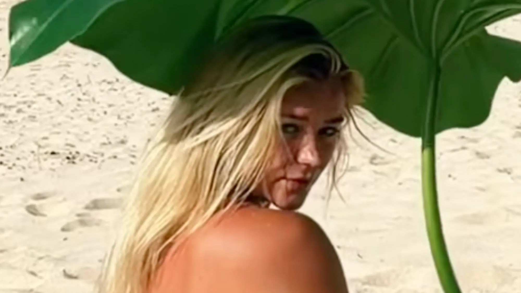 Stunning golf influencer Katie Sigmond goes completely naked on beach as she glows showing off VERY intimate tanlines