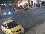 Moment thieves use forklift to tear apart cash machine from funeral director's building on high street