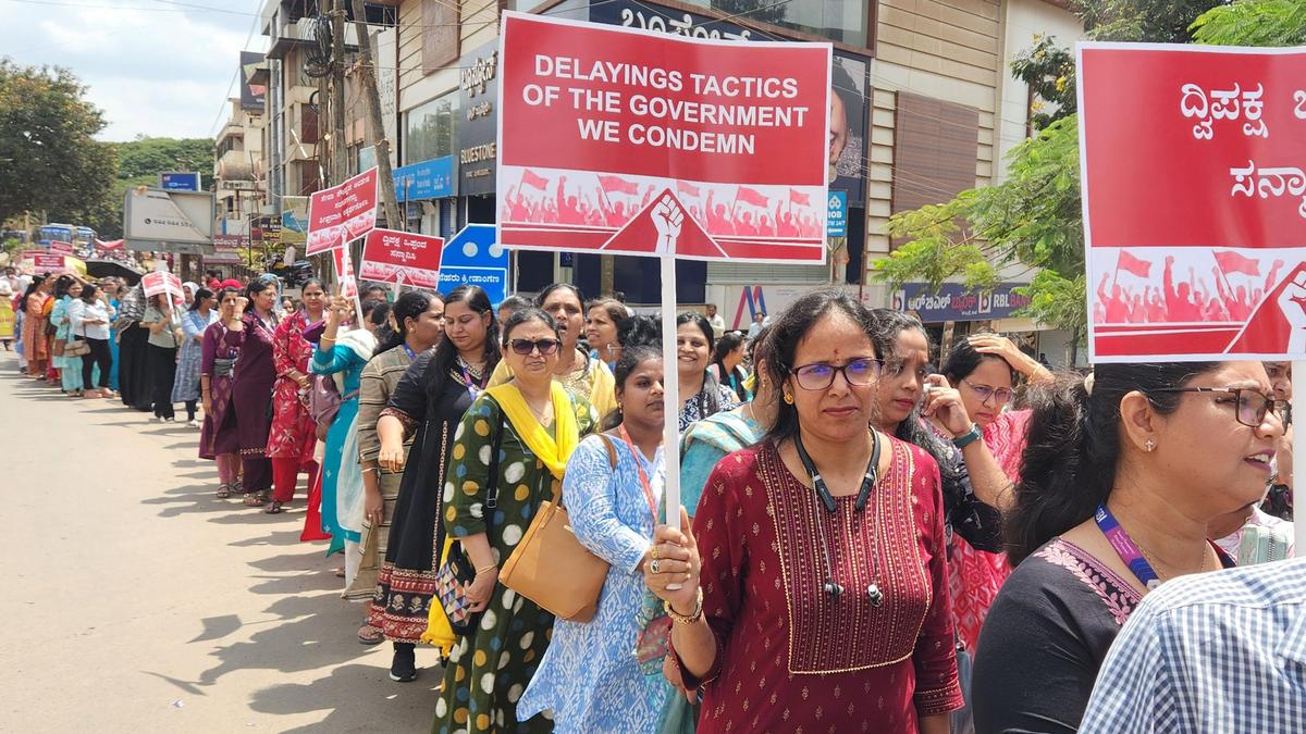 Seeking five-day banking week, employees take out protest march, stage demonstration