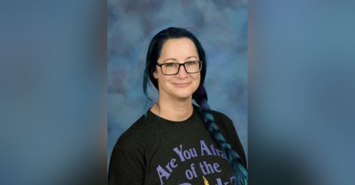 School social worker assisting others hit, killed by pickup trying to avoid wreck