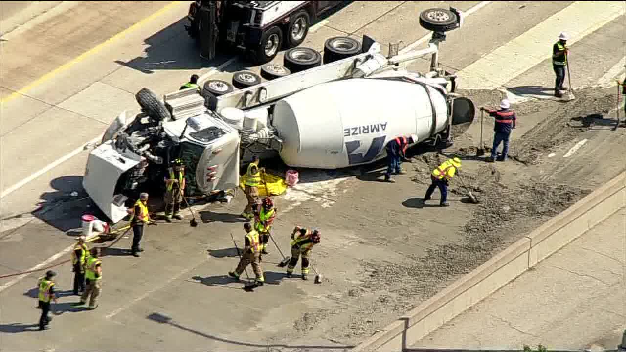 Overturned cement truck closes southbound DNT