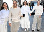 Katie Holmes, 47, looks totally smitten with toyboy Jason Bard Yarmosky, 39, as they hold hands during NYFW