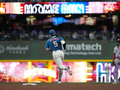 Garrett Mitchell hits grand slam and MLB-best Brewers pound Reds 20-0 to clinch playoff spot