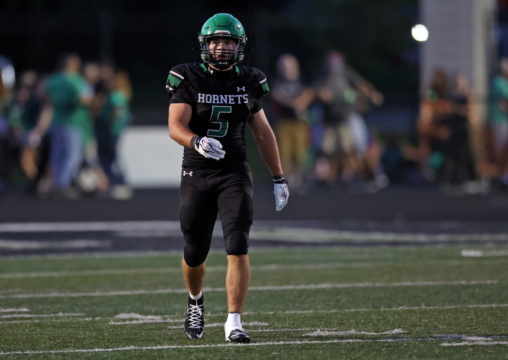 Highland defense dominates in 23-21 conference opener win