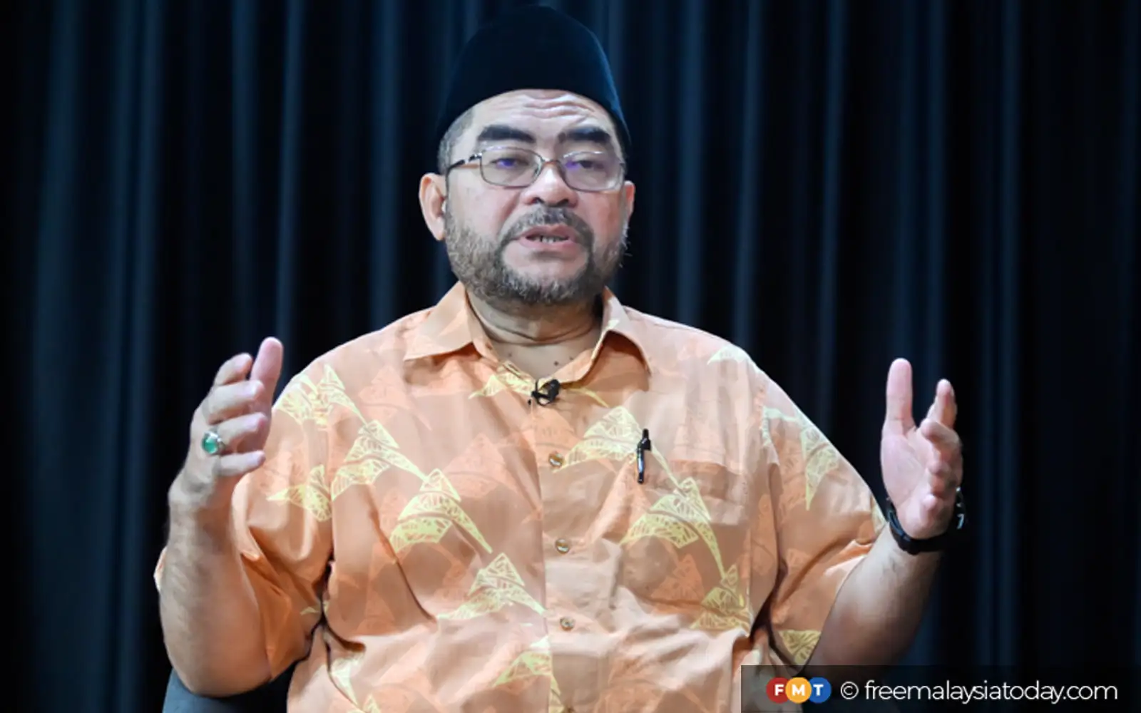 Jangan layan desakan Umno untuk PRU awal, Mujahid gesa Anwar