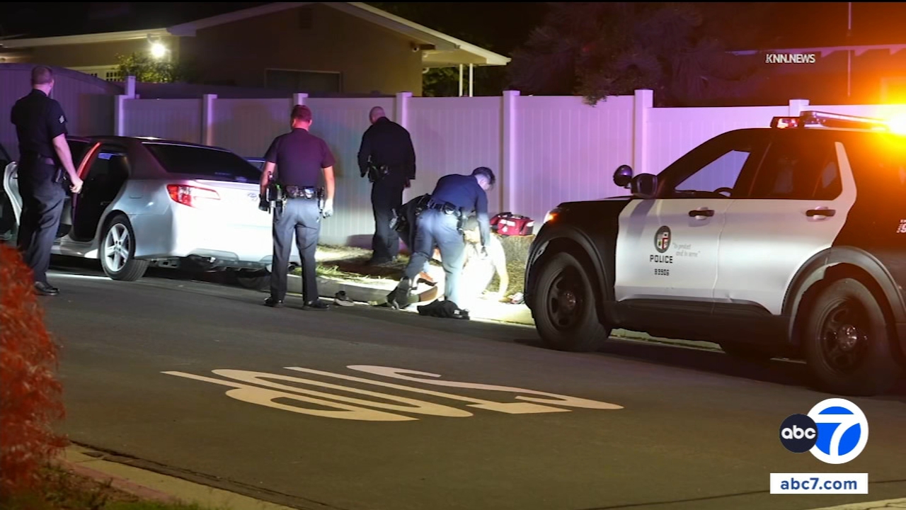 1 man shot to death, another wounded while sitting in parked car in Granada Hills